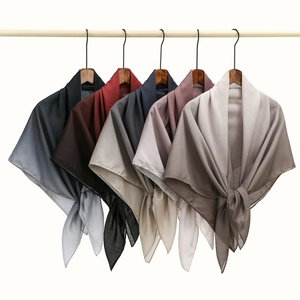 Row of gradient voile scarves in Morandi colors showing lightweight sheer fabric texture