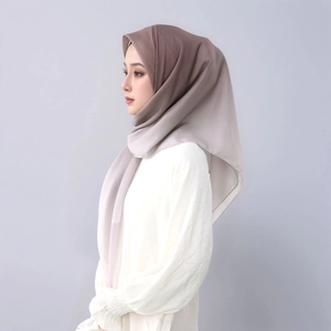 Detail of gradient coffee brown to beige hijab with light chiffon texture
