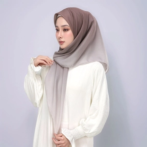 Detail of gradient hijab fabric showing fine texture and brown to grey soft transition