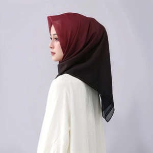 Detailed view of ombre gradient voile hijab showing burgundy to black color transition