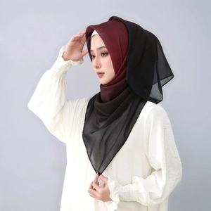 Detail of gradient hijab scarf transitioning from deep wine red to elegant black