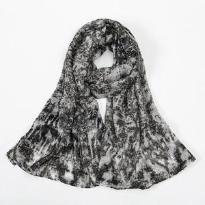Detail shot of lightweight bali yarn scarf with black and grey abstract ink texture