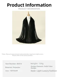 Detail view of black 190x85cm polyester pearl bubble shawl with lightweight texture
