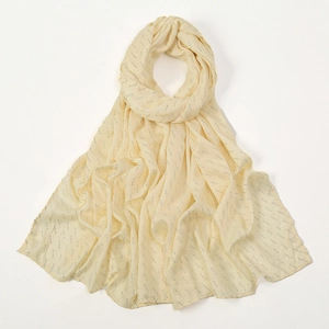 Close-up of pearl bubble shawl with silver rhinestone details and crinkled texture