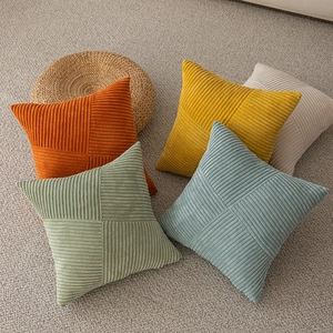 Corduroy square pillow covers with windmill patchwork in assorted soft colors