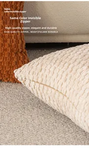 Close-up of the same-color invisible zipper on textured popcorn fabric cushion covers