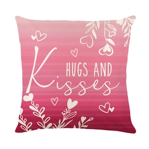 Pink gradient Valentine cushion cover with heart print and Hugs and Kisses text