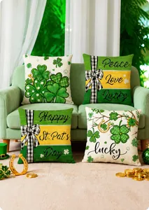 Set of four St. Patrick's Day pillow covers with green shamrocks and horseshoe designs