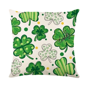 St. Patrick's Day green clover pillow cover with lucky script on white linen fabric