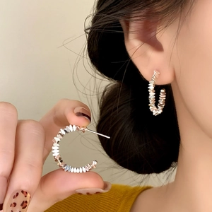 Chic silver geometric C-shaped textured earrings with layered scale pattern for women