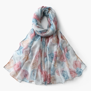 Close-up of floral pattern and lightweight voile texture on a women's scarf