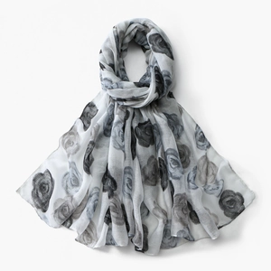 Detailed close-up of lightweight voile scarf with elegant grey floral rose print pattern