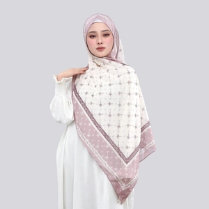 Detail of elegant floral print chiffon hijab showing soft texture and geometric patterns