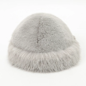 Elegant silver grey faux fur winter hat with thick plush trim for outdoor warmth