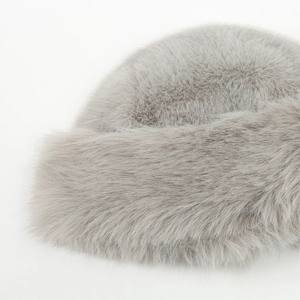 Stylish light gray faux fur winter hat with thick plush lining for outdoor warmth