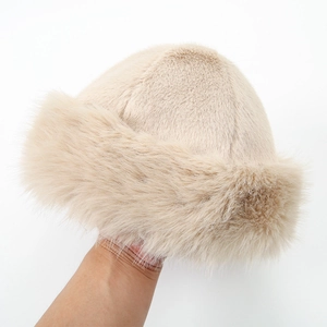 Detail of plush faux fox fur texture on a cream winter Cossack style Mongolian hat
