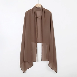 Detail of caramel brown chiffon hijab scarf showing lightweight fabric and smooth texture