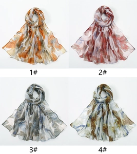 Detail showing colorful floral print bali yarn scarves in four different color palettes