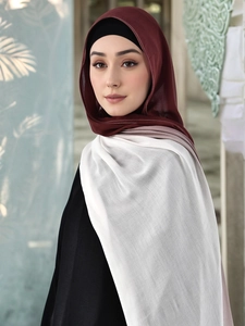 Close-up of lightweight modal hijab featuring elegant burgundy and pink gradient blocks