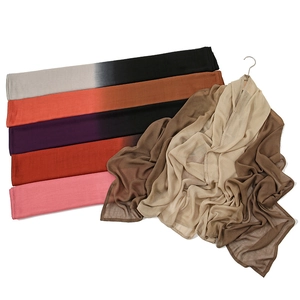 Close-up of soft gradient modal scarves showing breathable fabric texture and diverse colors