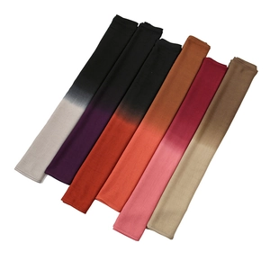 Detail of six ombre gradient modal scarves showing seamless color transitions and textures