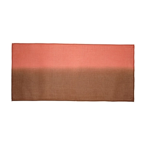 Detailed view of pink and brown gradient fabric texture on a soft crinkle scarf
