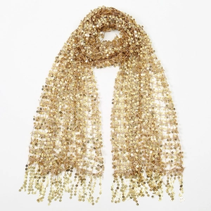 Detailed close-up of champagne gold sequin scarf featuring shimmering mesh and long tassels