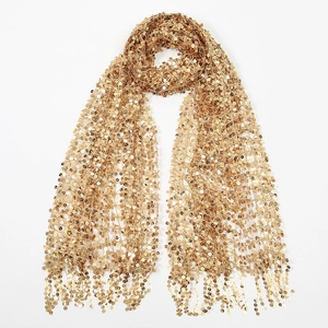 Detail of elegant gold sequin shawl featuring woven mesh and hanging tassel fringe
