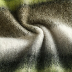 Cozy thick cashmere feel scarf detail with soft fuzzy texture and chic colorful stripes.
