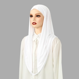 Detailed view of white breathable jersey hijab with inner cap on mannequin head