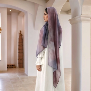 Detail of long purple gradient rayon headscarf with elegant draped texture for women