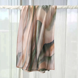 Detail of floral printed headscarf with soft watercolor ink abstract dye pattern