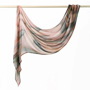 Detail of lightweight printed floral headscarf with pink and grey abstract patterns