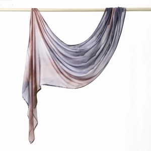 Detail of gradient pink and purple rayon headscarf with refined hemmed edges