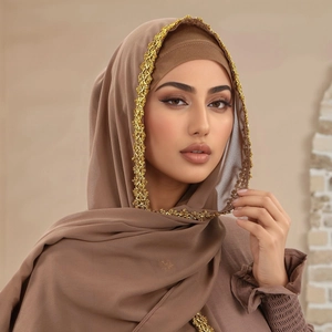 Elegant brown chiffon hijab with intricate gold lace edges and matching inner cap