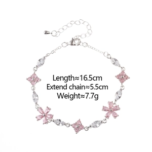 Detail of silver flower bracelet with pink and white zircons showing adjustable chain