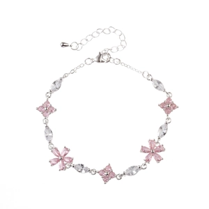 Elegant silver bracelet with pink flower zircon stones and adjustable chain on white background