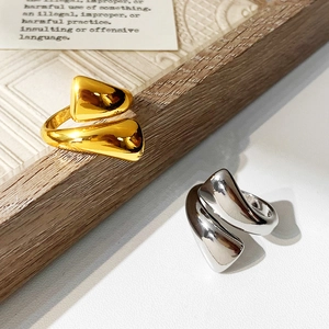 Polished liquid metal style open rings in gold and silver finish with wide wrap design