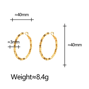 Minimalist gold geometric hoop earrings with textured finish and 40mm diameter size