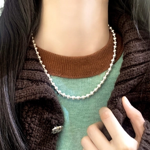 Elegant gold plated metal bead necklace for women with minimalist polished spheres