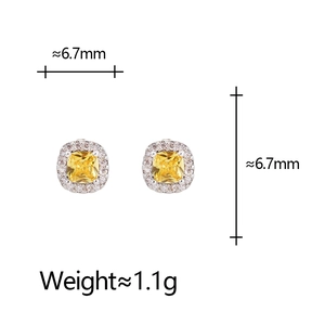 Détail macro de boucles d'oreilles zircon jaune 6,7mm avec pavage et spécifications