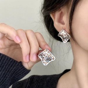 Vintage silver earrings with leopard print irregular design for women's luxury style
