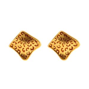 Retro leopard print earrings in golden metal with a minimalist vintage design