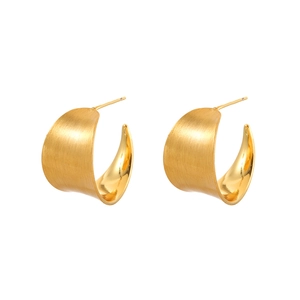 Minimalist wide gold hoop earrings with brushed finish and polished inner surface