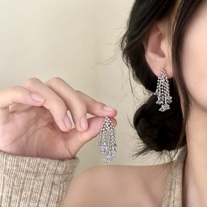 Elegant silver zircon tassel earrings featuring cascading bead chains and crystal accents