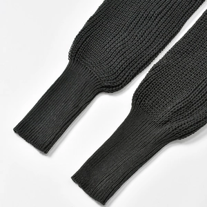 Detailed close-up of high-quality black knitted cuffs with elastic ribbed texture