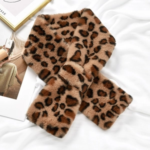Detail of plush faux rabbit fur leopard print scarf with crisscross fastening closure