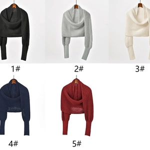 Women's solid knit shrug featuring irregular cross batwing sleeves in five colors