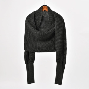 Women's black knit shrug sweater with irregular cross batwing sleeves and ribbed cuffs