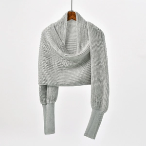 Light grey knitted short shawl sweater with chunky knit texture and ribbed long sleeves